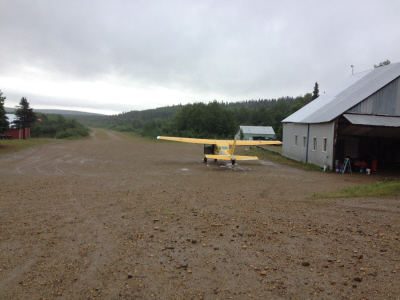 The unpaved runway near the camp